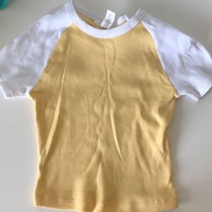 A yellow and white t-shirt.